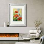 Tablou Maci Red poppies cu paspartu, intr-un living modern cu semineu si fotoliu alb